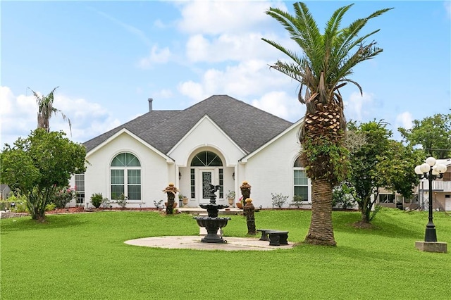 5227 Shady Park Dr, Marrero, LA 70072 - view of front of property with a shingled roof, a front lawn, and french doors