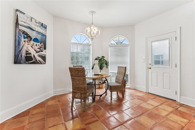 5227 Shady Park Dr, Marrero, LA 70072 - dining room featuring a chandelier and light tile patterned floors