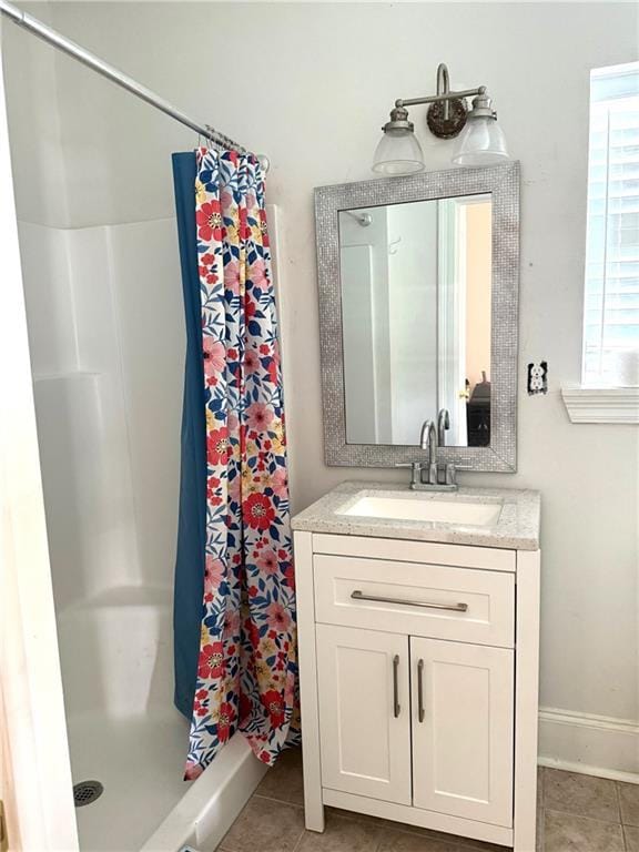 5227 Shady Park Dr, Marrero, LA 70072 - full bath featuring a shower stall, vanity, and tile patterned floors
