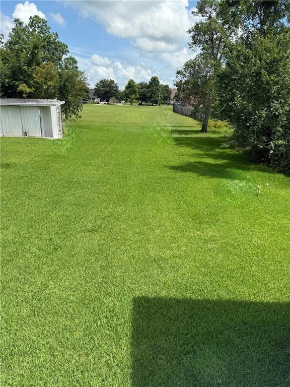 5227 Shady Park Dr, Marrero, LA 70072 - view of green lawn