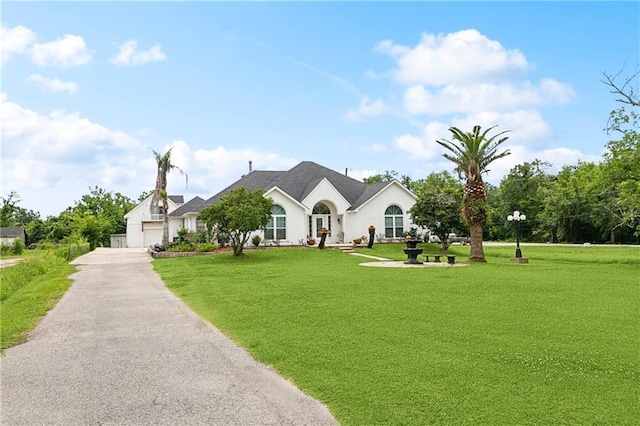 5227 Shady Park Dr, Marrero, LA 70072 - view of front of house featuring a front yard and a garage