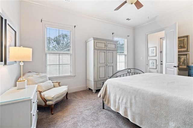 bedroom with visible vents, ceiling fan, baseboards, ornamental molding, and light carpet