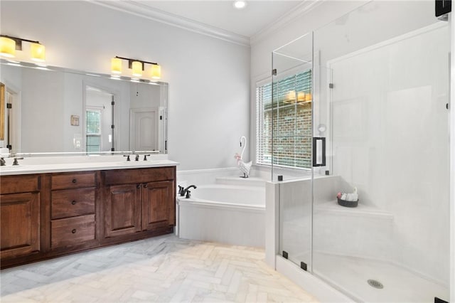 bathroom featuring a healthy amount of sunlight, a stall shower, a sink, ornamental molding, and a garden tub