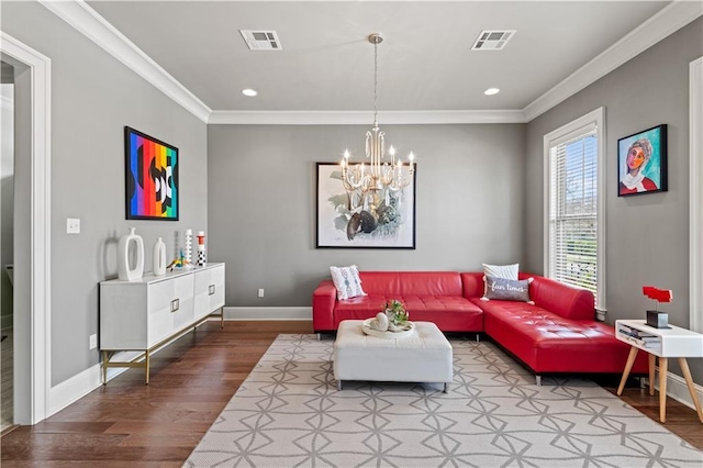 living room with wood finished floors, visible vents, and ornamental molding