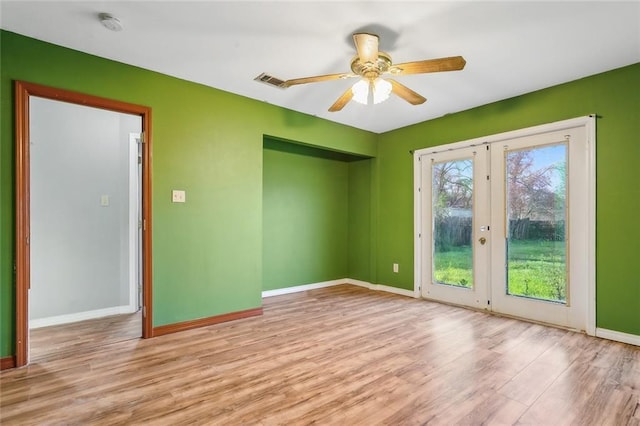 105 Palm Springs Dr, Slidell, LA 70458 - unfurnished room featuring ceiling fan, visible vents, baseboards, and wood finished floors