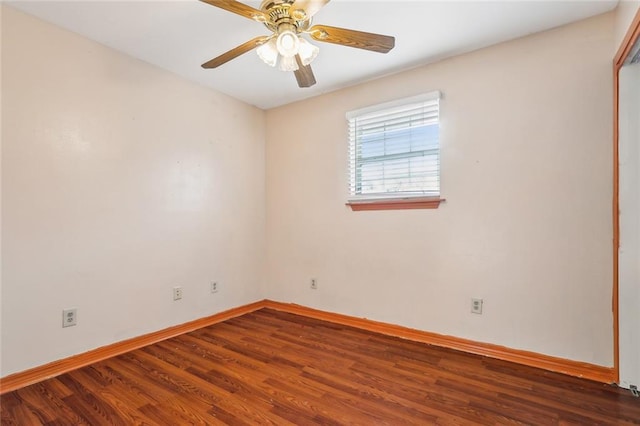 105 Palm Springs Dr, Slidell, LA 70458 - spare room featuring a ceiling fan, wood finished floors, and baseboards