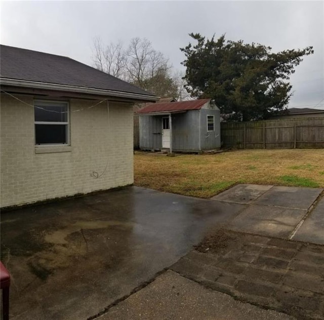 4928 Sandalwood St, New Orleans, LA 70127 - exterior space featuring a storage shed, an outdoor structure, and fence