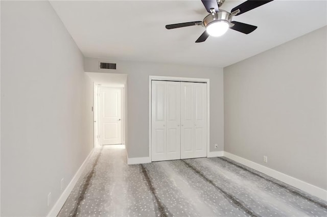 1430 Jackson Ave Unit 302, New Orleans, LA 70130 - unfurnished bedroom featuring a closet and a ceiling fan
