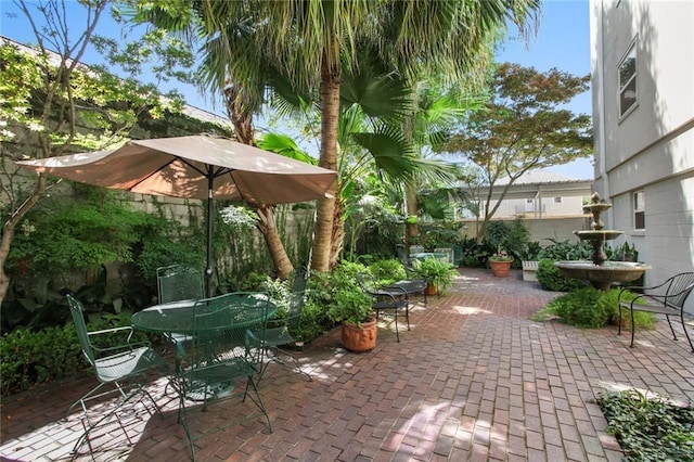 1430 Jackson Ave Unit 302, New Orleans, LA 70130 - view of patio featuring outdoor dining area
