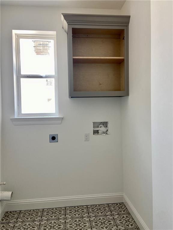 1169 Fox Sparrow Loop, Madisonville, LA 70447 - washroom with electric dryer hookup, baseboards, hookup for a washing machine, and tile patterned flooring