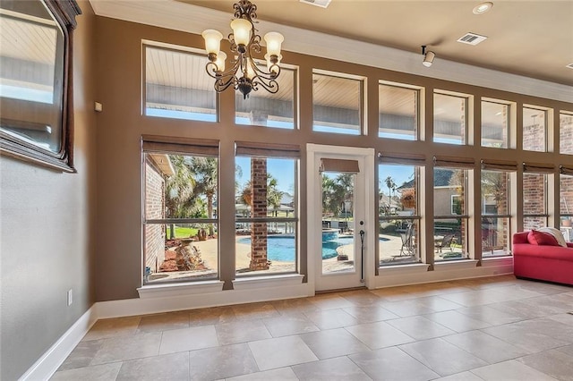 318 Cape Breton Dr, Slidell, LA 70458 - doorway with a notable chandelier, visible vents, tile patterned floors, and baseboards
