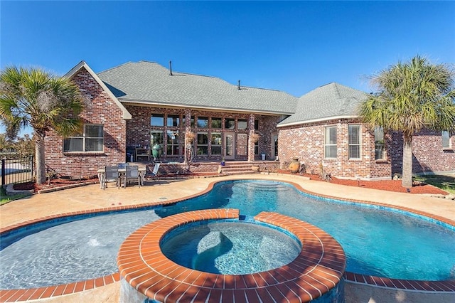 318 Cape Breton Dr, Slidell, LA 70458 - view of swimming pool with a pool with connected hot tub, a patio, and fence