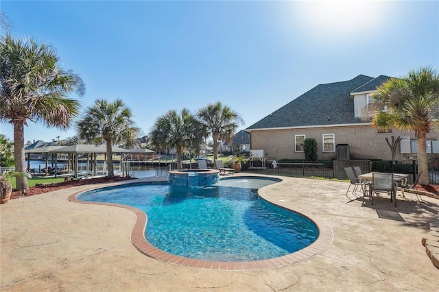 318 Cape Breton Dr, Slidell, LA 70458 - view of swimming pool featuring a patio area, central air condition unit, a pool with connected hot tub, and fence