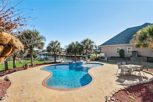 318 Cape Breton Dr, Slidell, LA 70458 - view of pool featuring a patio area, fence, and a pool with connected hot tub