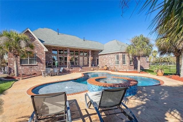 318 Cape Breton Dr, Slidell, LA 70458 - view of pool with a patio area, fence, and a pool with connected hot tub