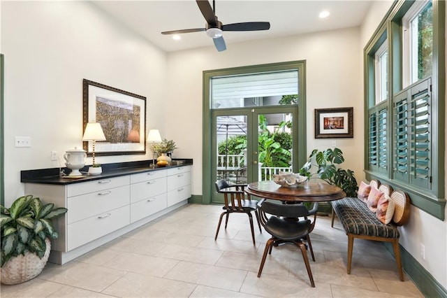 1930 Napoleon Ave, New Orleans, LA 70115 - dining space featuring a ceiling fan, recessed lighting, light tile patterned floors, and french doors
