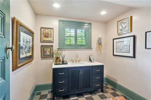 1930 Napoleon Ave, New Orleans, LA 70115 - bathroom with tile patterned floors, vanity, and recessed lighting