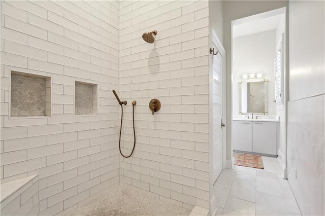 1930 Napoleon Ave, New Orleans, LA 70115 - bathroom with a tile shower, vanity, and tile patterned floors