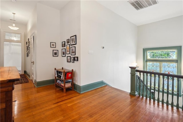 1930 Napoleon Ave, New Orleans, LA 70115 - corridor featuring an upstairs landing and wood-type flooring
