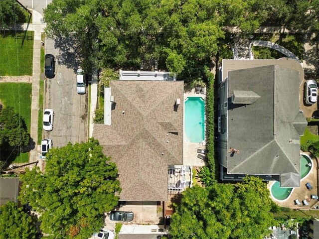 1930 Napoleon Ave, New Orleans, LA 70115 - back of house featuring covered porch, stucco siding, a fenced front yard, french doors, and a chimney