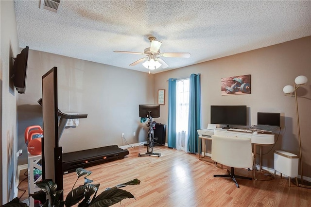 1700 Marseille Dr Unit 2, La Place, LA 70068 - office area with visible vents, a textured ceiling, ceiling fan, and wood finished floors