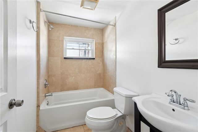 84143 Washington Ave, New Orleans, LA 70130 - full bath featuring a sink, toilet, washtub / shower combination, and tile patterned flooring