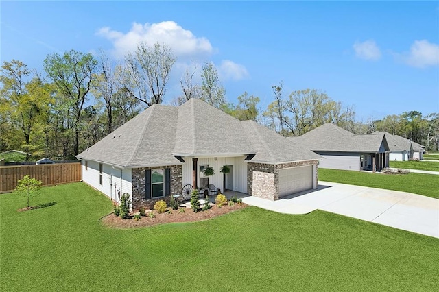 41379 Schafer Dr, Hammond, LA 70403 - view of front facade with driveway, an attached garage, and roof with shingles