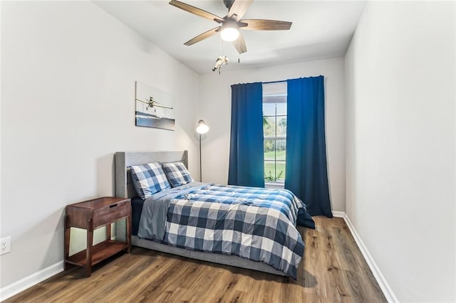 41379 Schafer Dr, Hammond, LA 70403 - bedroom featuring wood finished floors and a ceiling fan