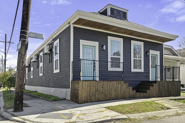 view of home's exterior featuring a porch