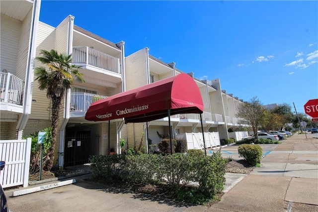 3805 Houma Blvd Unit 219A, Metairie, LA 70006 - view of building exterior featuring uncovered parking