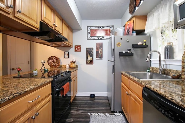3805 Houma Blvd Unit 219A, Metairie, LA 70006 - kitchen with appliances with stainless steel finishes, dark wood-type flooring, and dark stone countertops