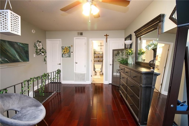 3805 Houma Blvd Unit 219A, Metairie, LA 70006 - living area with dark wood finished floors and ceiling fan