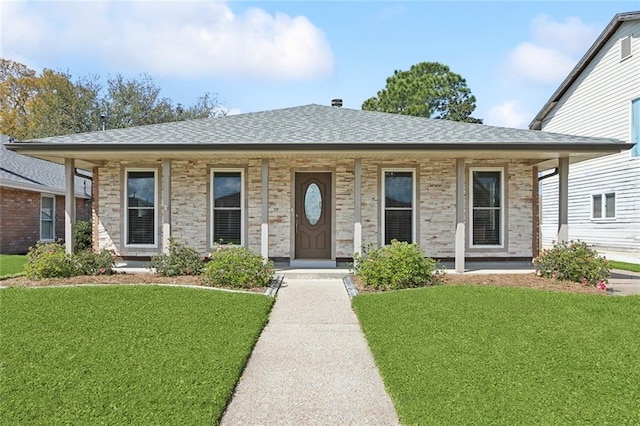 view of front of house with a porch, a front yard, and roof with shingles
