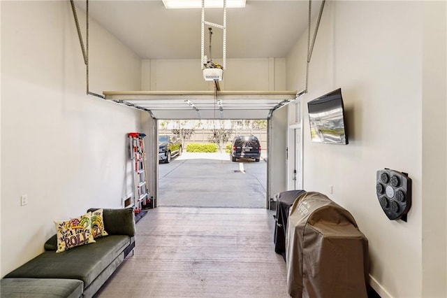 2109 Prytania St, New Orleans, LA 70130 - garage featuring a garage door opener