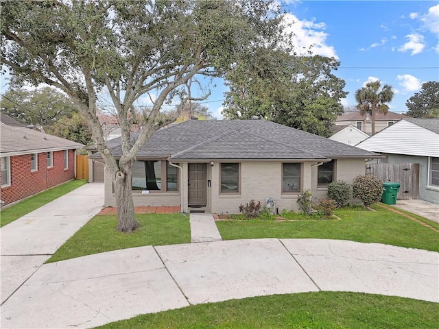 508 Sena Dr, Metairie, LA 70005 - bungalow featuring roof with shingles and brick siding