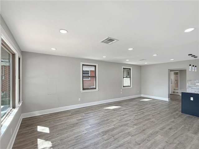 508 Sena Dr, Metairie, LA 70005 - unfurnished room featuring wood finished floors and recessed lighting