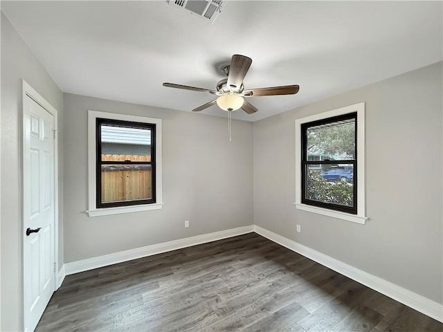 508 Sena Dr, Metairie, LA 70005 - unfurnished room with dark wood-type flooring and ceiling fan