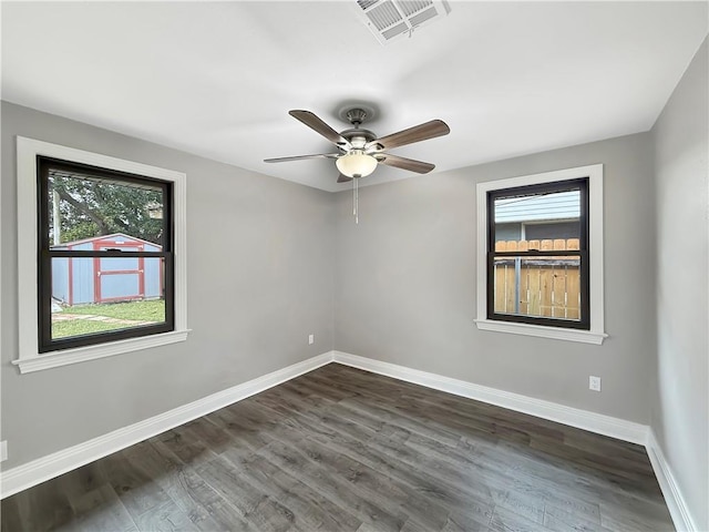 508 Sena Dr, Metairie, LA 70005 - spare room with ceiling fan and dark wood-type flooring