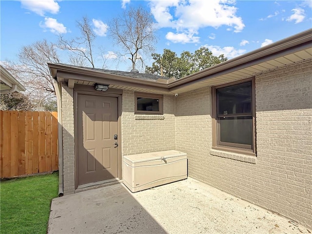 508 Sena Dr, Metairie, LA 70005 - doorway to property featuring brick siding and a patio