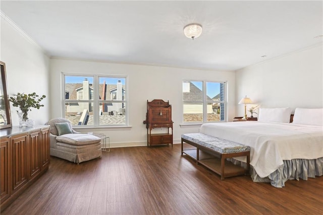 805 Rue Royal St, Metairie, LA 70005 - bedroom featuring crown molding, dark wood-type flooring, and baseboards