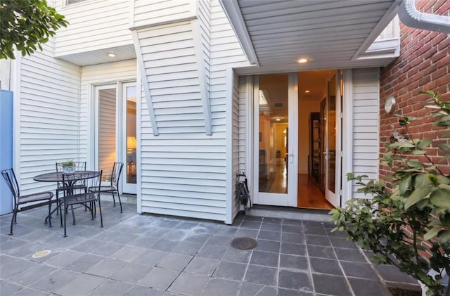 805 Rue Royal St, Metairie, LA 70005 - property entrance with outdoor dining area and a patio area