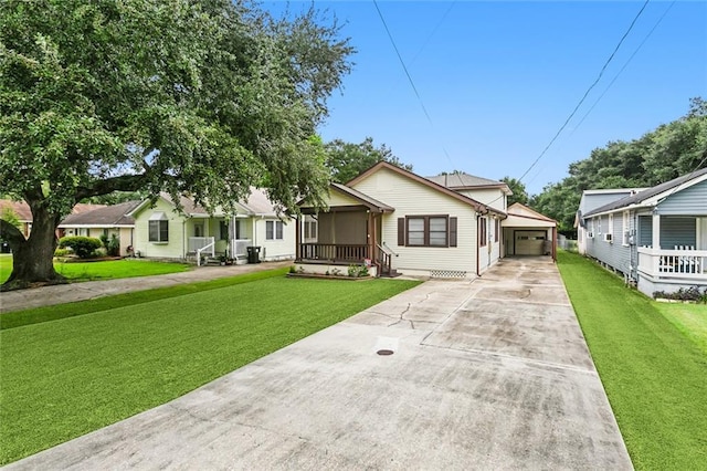 1534 General Collins Ave, New Orleans, LA 70114 - view of front of property with an attached garage, concrete driveway, an outdoor structure, and a front yard