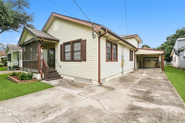 1534 General Collins Ave, New Orleans, LA 70114 - view of front of property featuring crawl space, driveway, an attached garage, and a front yard