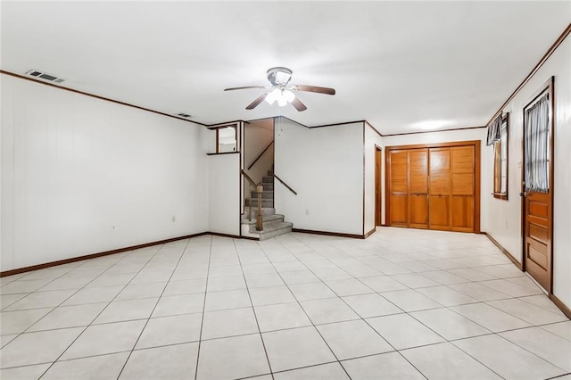 1534 General Collins Ave, New Orleans, LA 70114 - unfurnished room with visible vents, a ceiling fan, stairway, crown molding, and baseboards