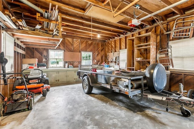 1534 General Collins Ave, New Orleans, LA 70114 - garage featuring a workshop area and a garage door opener