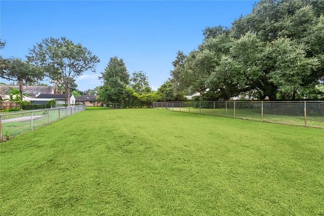 1534 General Collins Ave, New Orleans, LA 70114 - view of yard featuring a fenced backyard