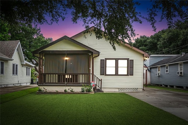 1534 General Collins Ave, New Orleans, LA 70114 - bungalow featuring a front lawn and concrete driveway