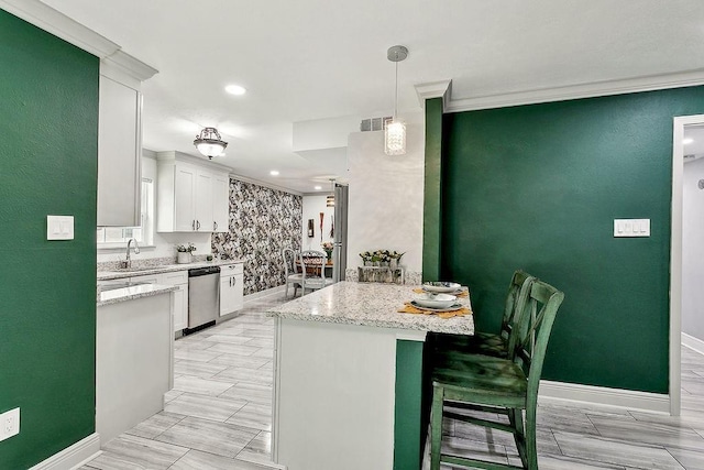 3631 Rue Colette, New Orleans, LA 70131 - kitchen featuring a sink, white cabinetry, dishwasher, ornamental molding, and baseboards