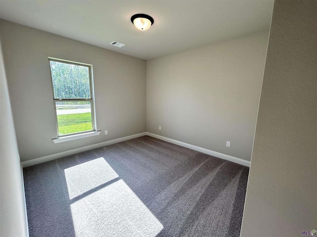 25307 Angele Dr, Ponchatoula, LA 70454 - spare room featuring carpet and baseboards