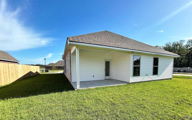 25307 Angele Dr, Ponchatoula, LA 70454 - back of house featuring a patio and a shingled roof